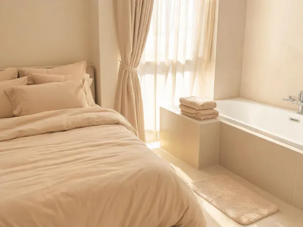 Bath and bedroom reset with curtains and linens